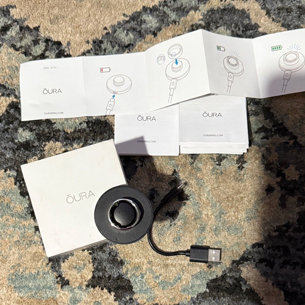 Oura ring and Black Charging Dock with USB Cable